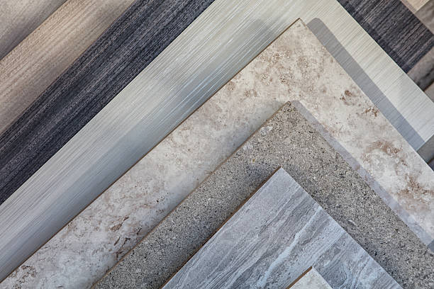 :Marble and granite stone surfaces shown side by side in natural light for home decor comparison