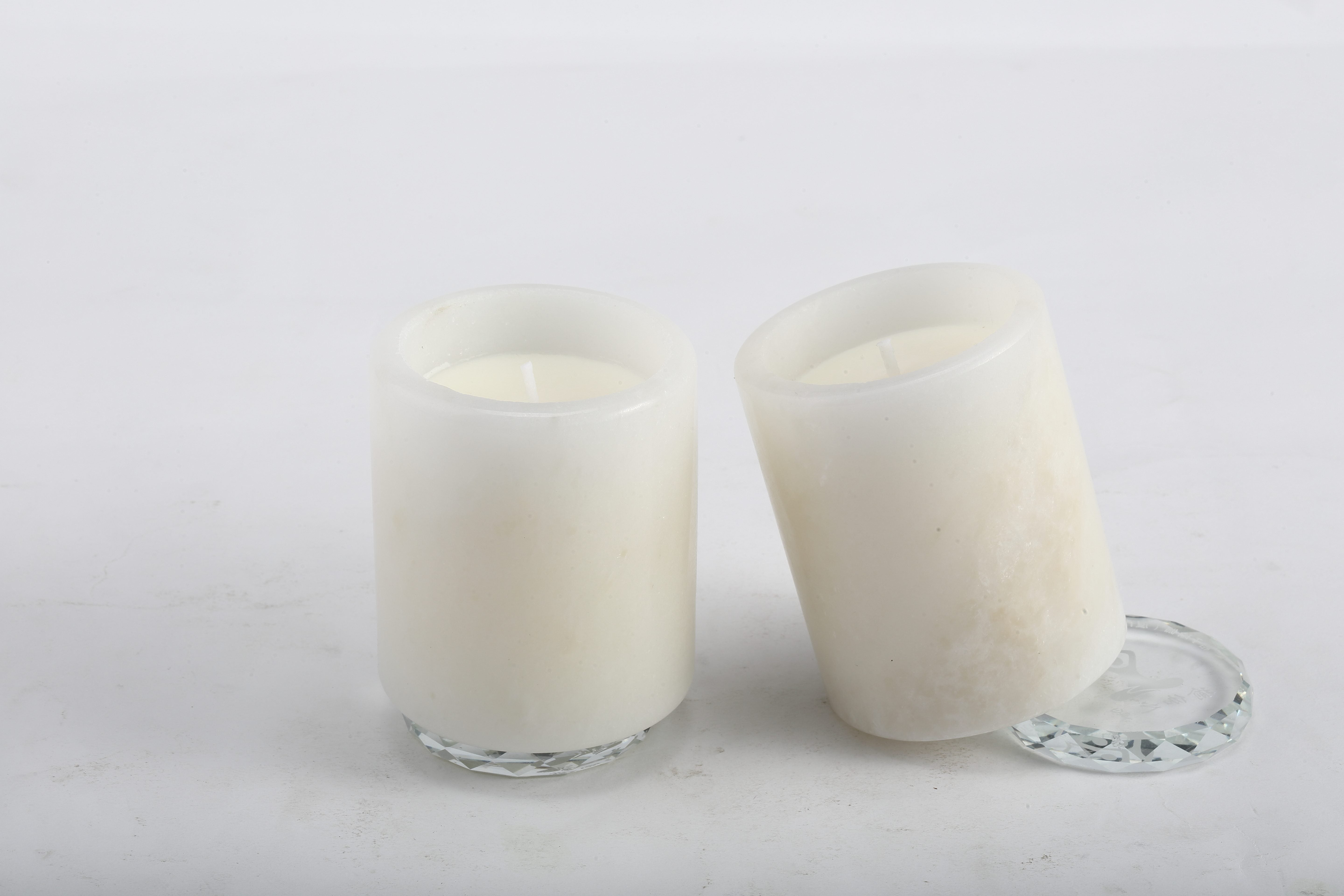 Koville white scented candle in natural stone