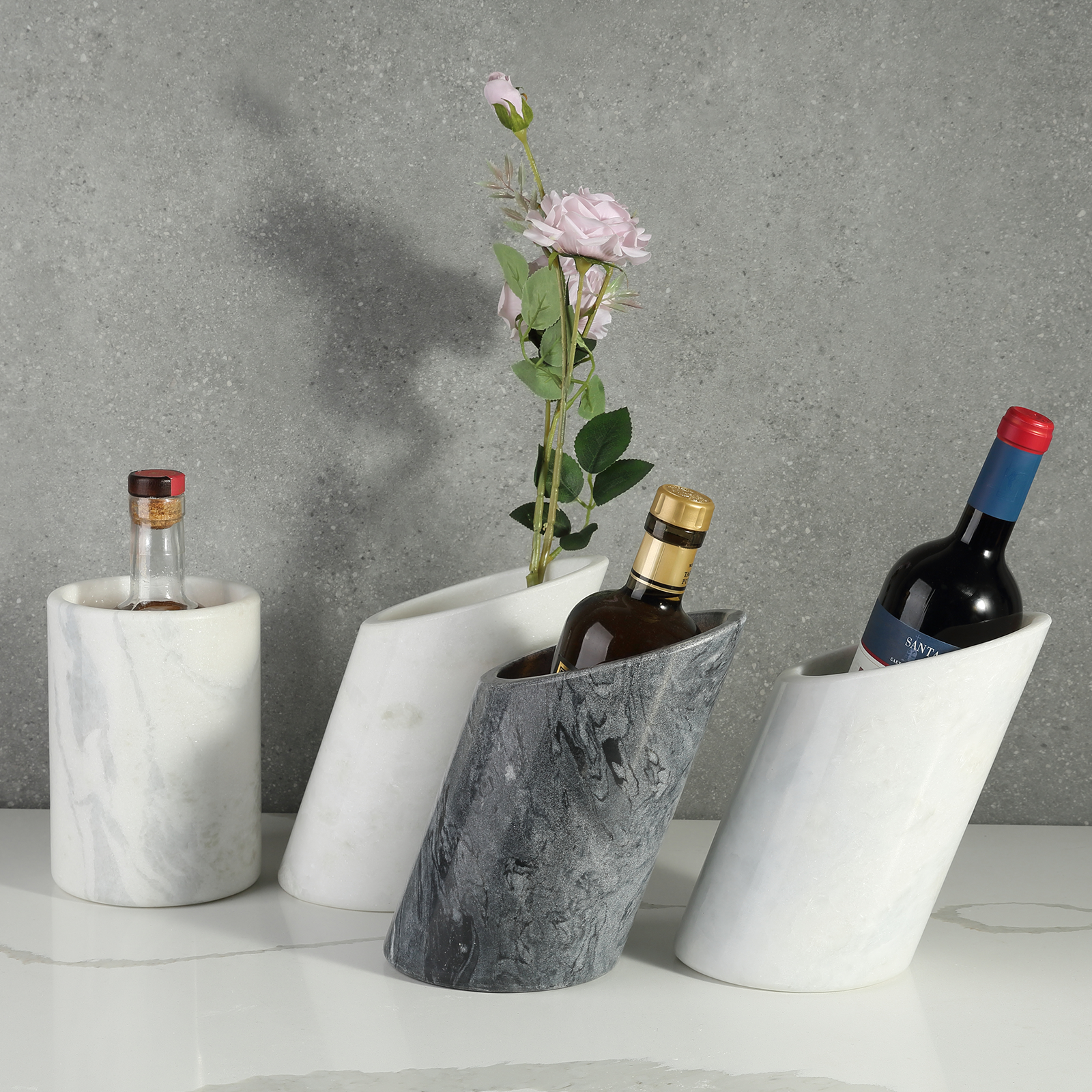 Koville Natural Stone Angled Wine Cooler in Namib Fantasy on a bar counter with a wine bottle