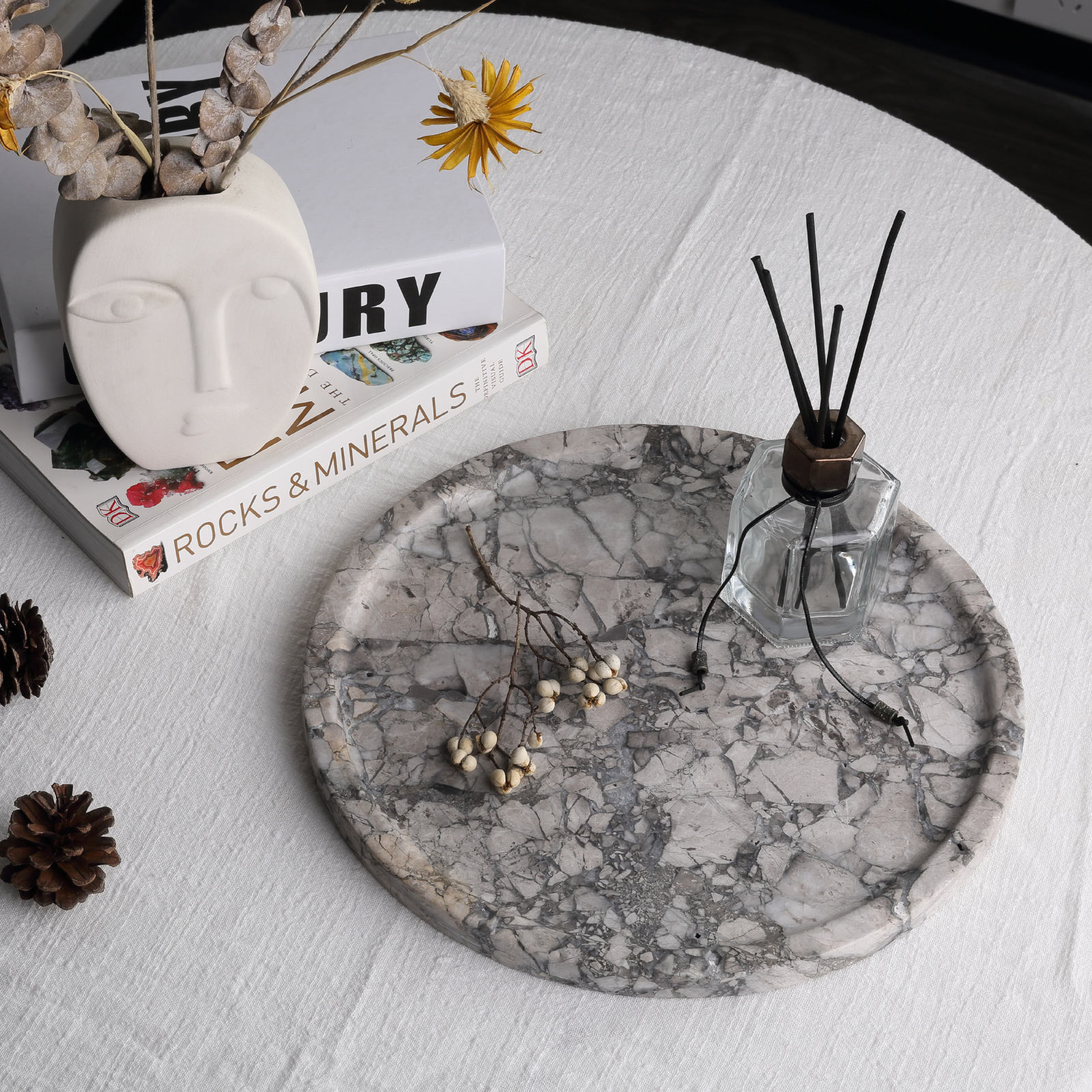 Koville round serving tray in multiple sizes for table styling in Silver Pearl natural stone