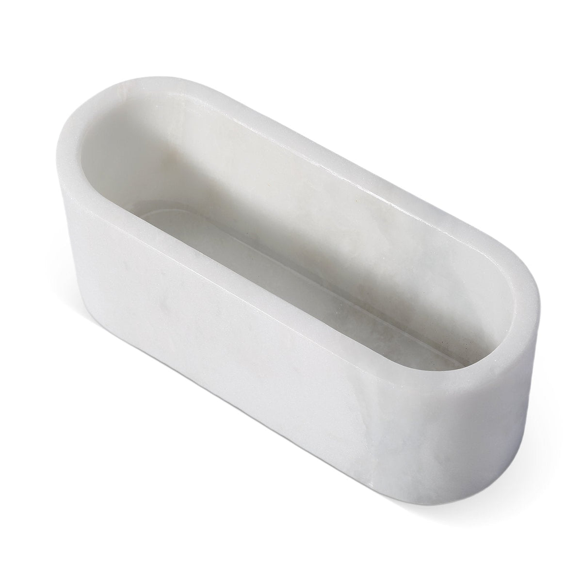 Koville candle holder in Namib Bianco with a lit tea light candle
