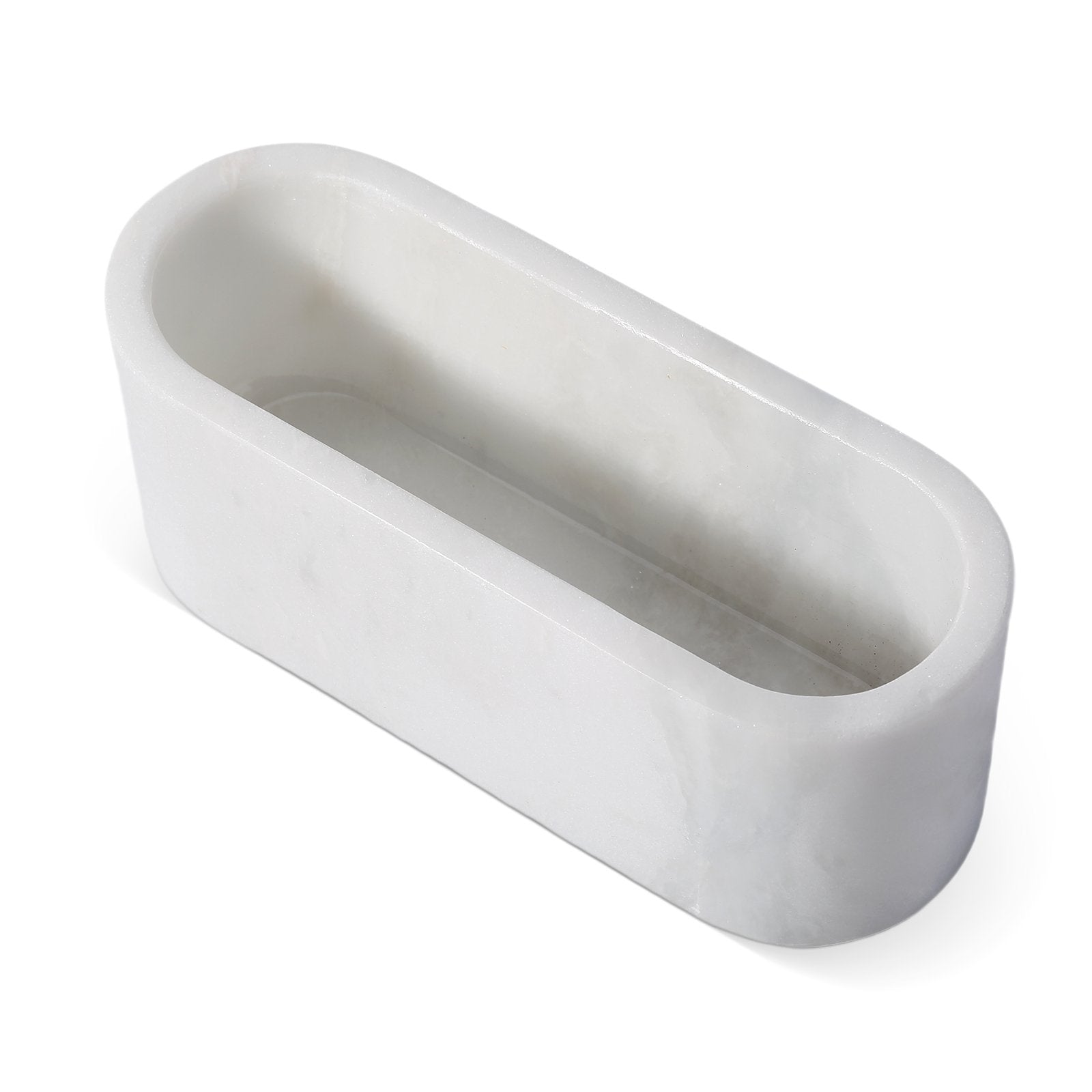 Koville natural marble candlelight cup 200 76 76 in Namib Bianco with a lit tea light candle