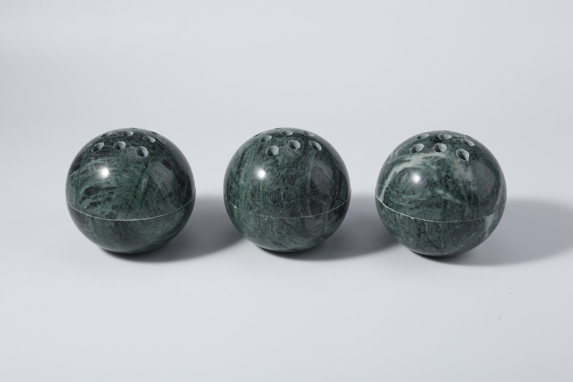 Koville natural marble incense burner d 100 in Indian Green with burning incense stick