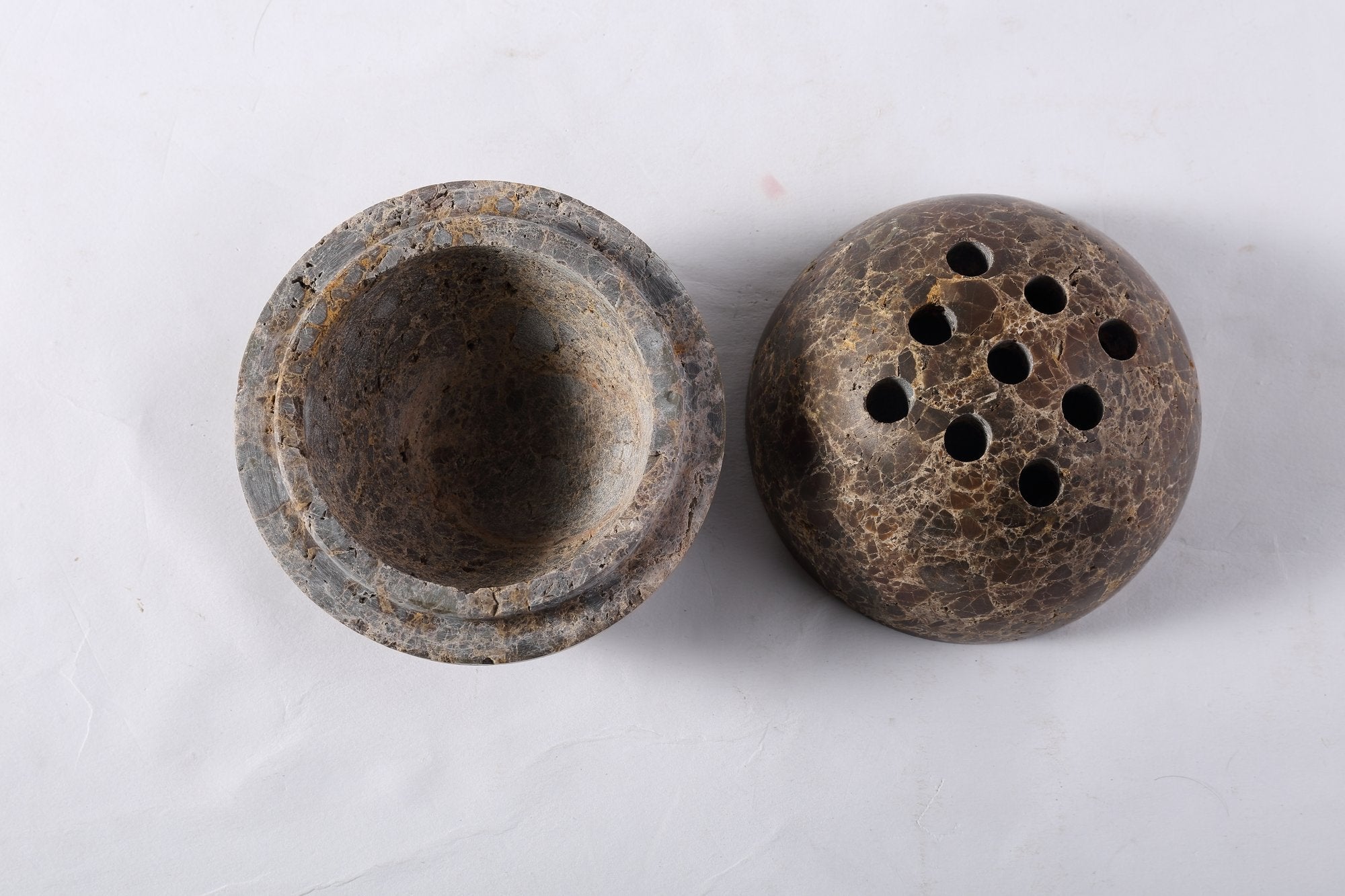 Koville natural marble incense burner d 100 in Light Emperador with burning incense stick