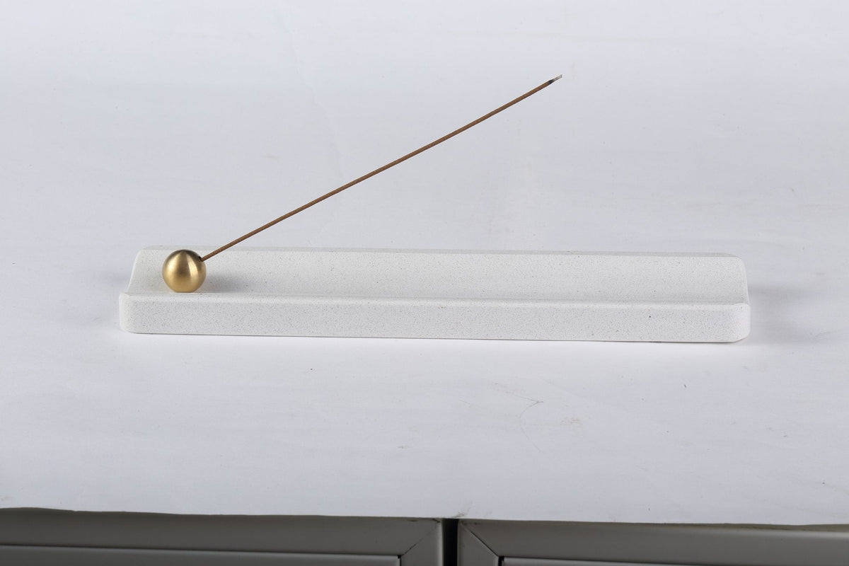 Koville incense holder in Ariete Quarella with burning incense stick