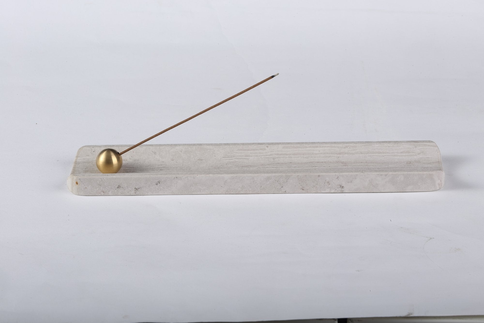 Koville natural marble incense holder in White Wooden with burning incense stick