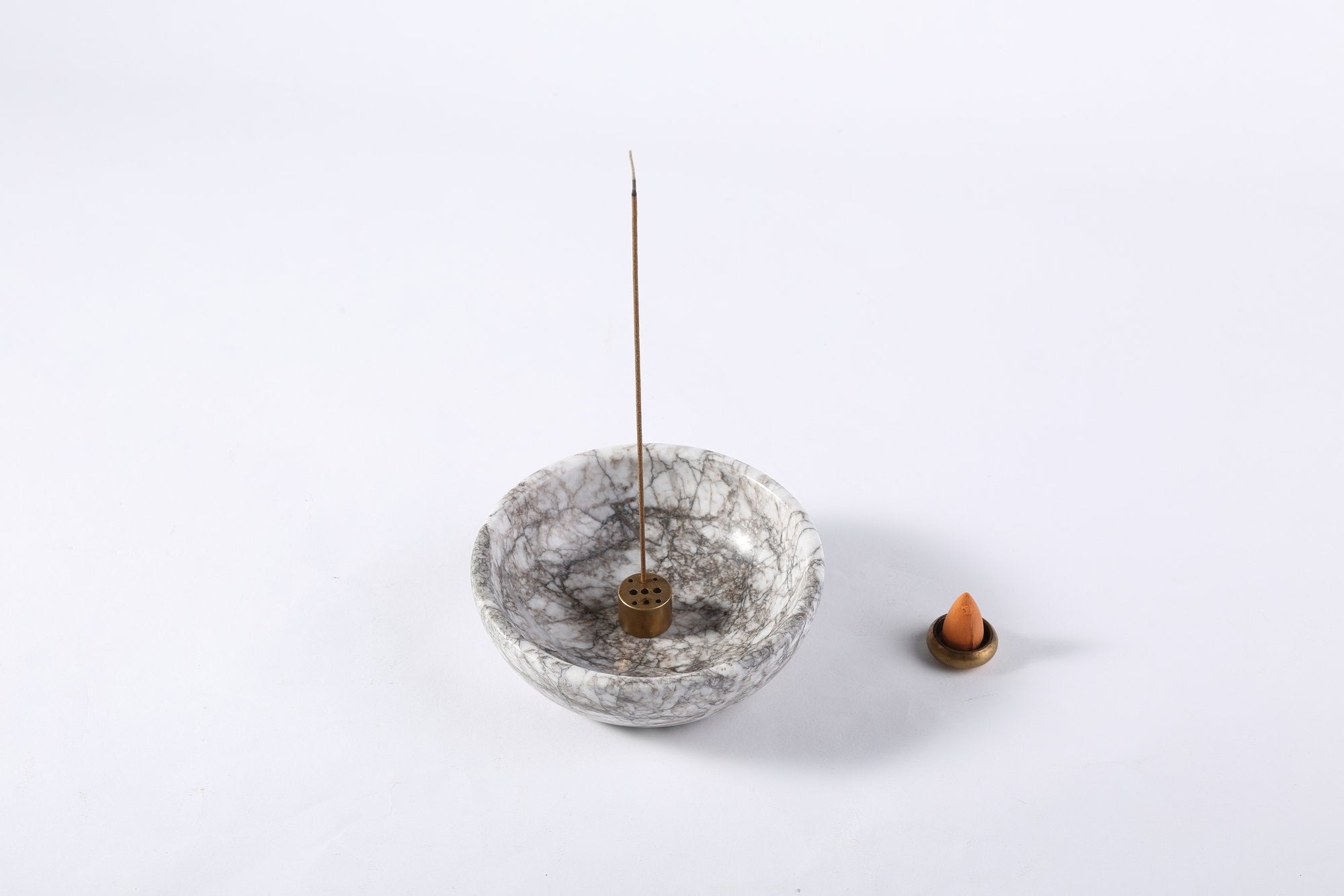 Koville natural marble incense holder pro d 150 t 40 in Limestone with burning incense stick