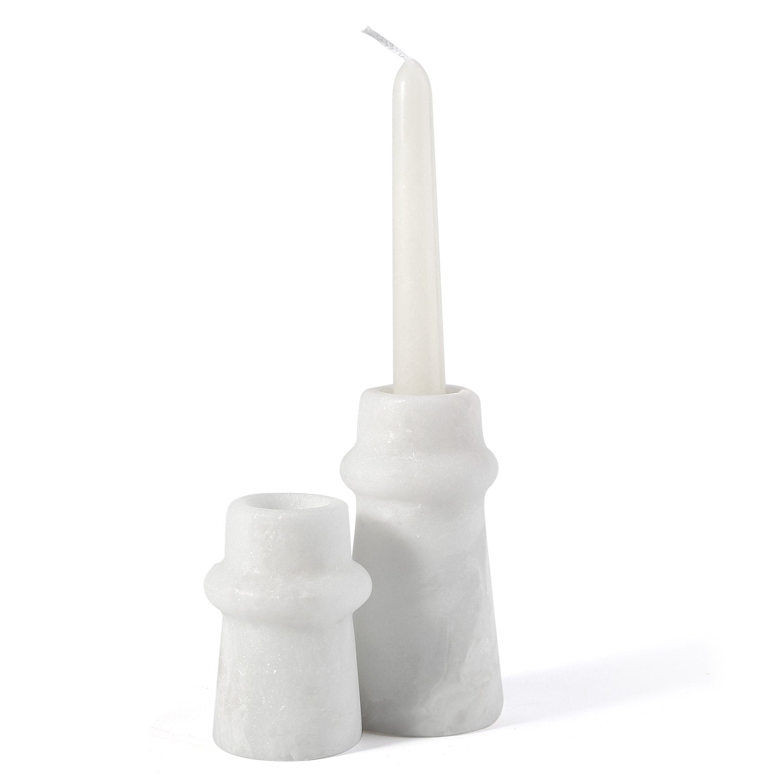 Koville natural marble orbit candle holder d 50 in Namib Bianco with a lit tea light candle