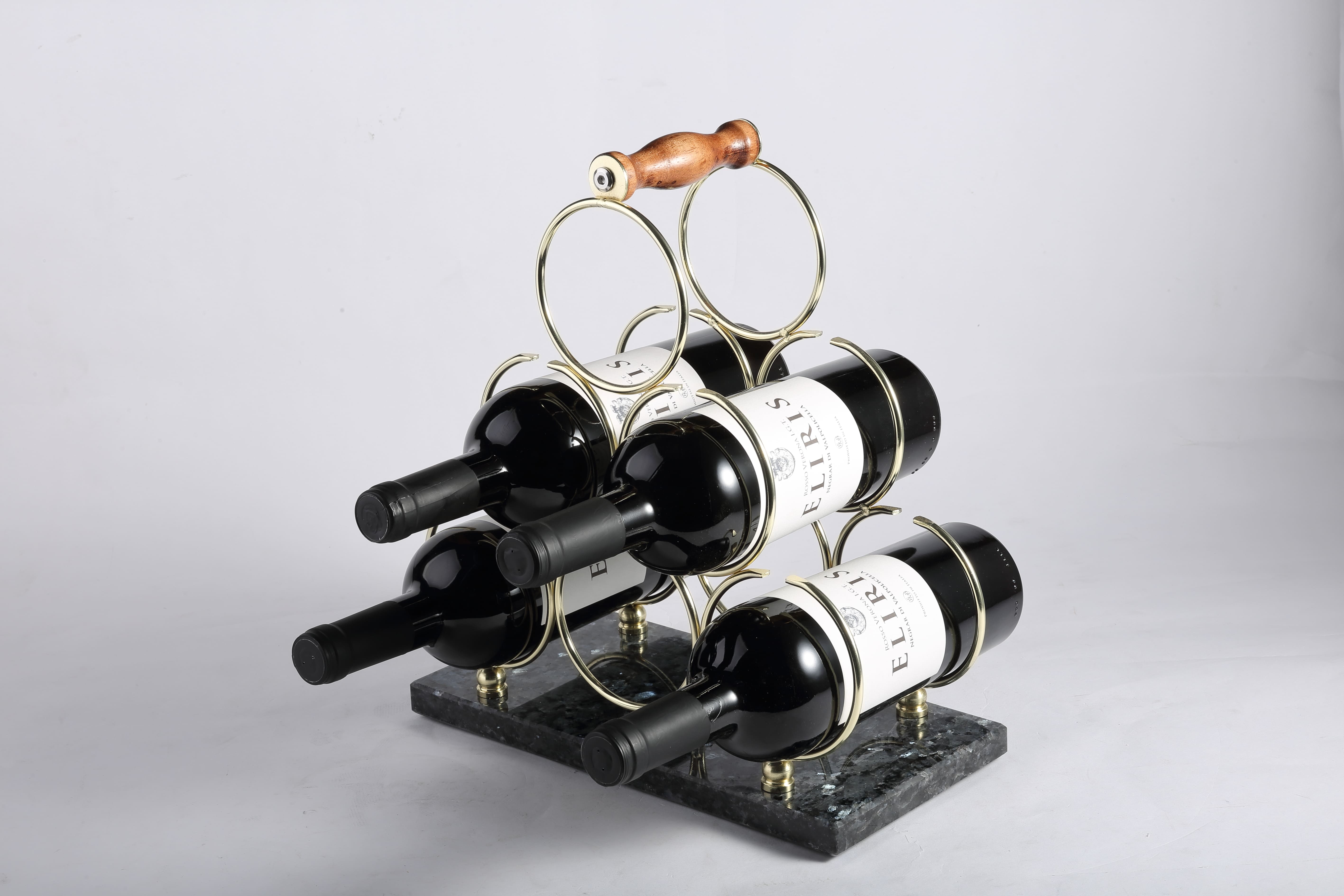 Koville Natural Stone Wine Rack in Blue Pearl on a kitchen counter holding wine bottles