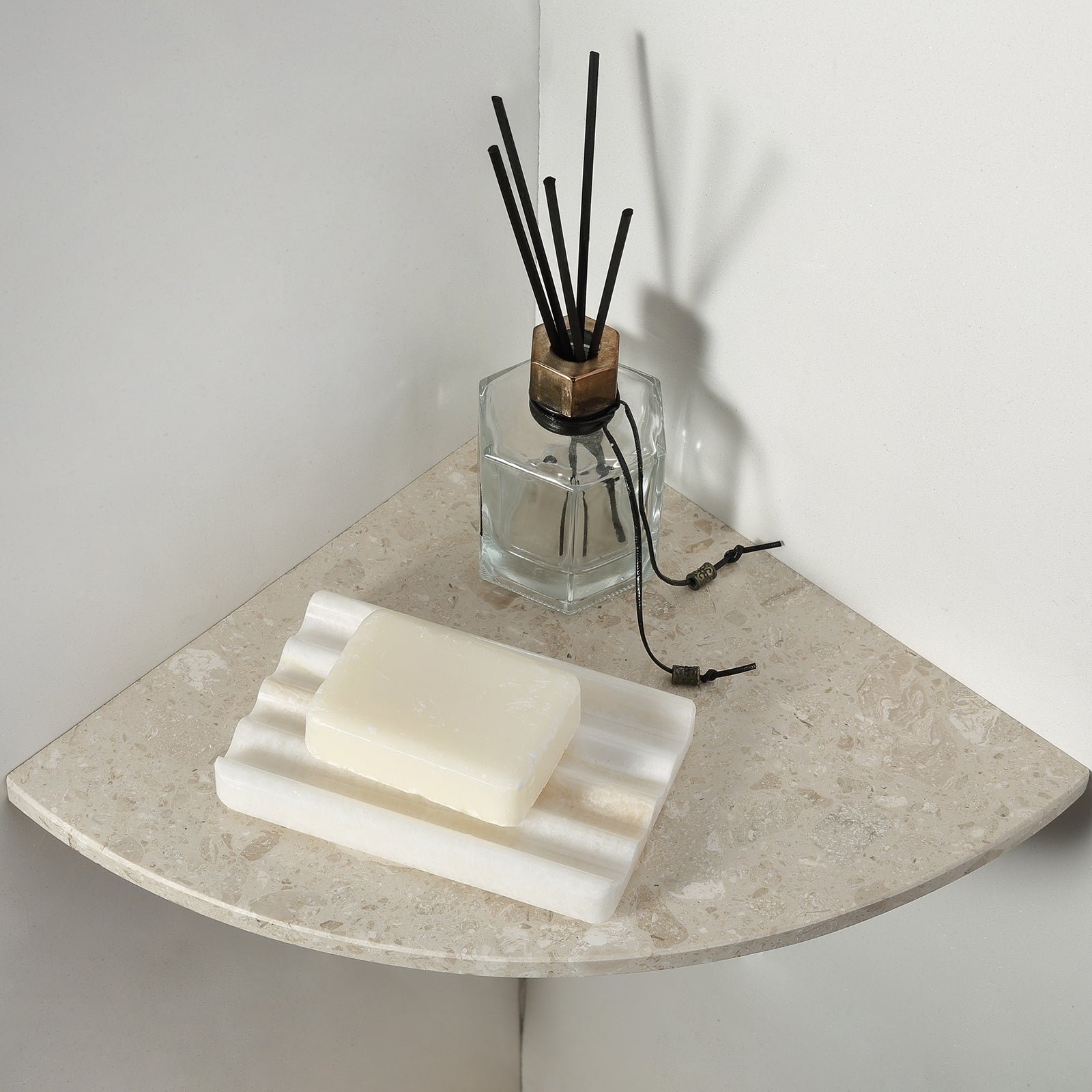 Koville Natural Onyx square wavy soap dish in Onyx White with sculpted wave surface