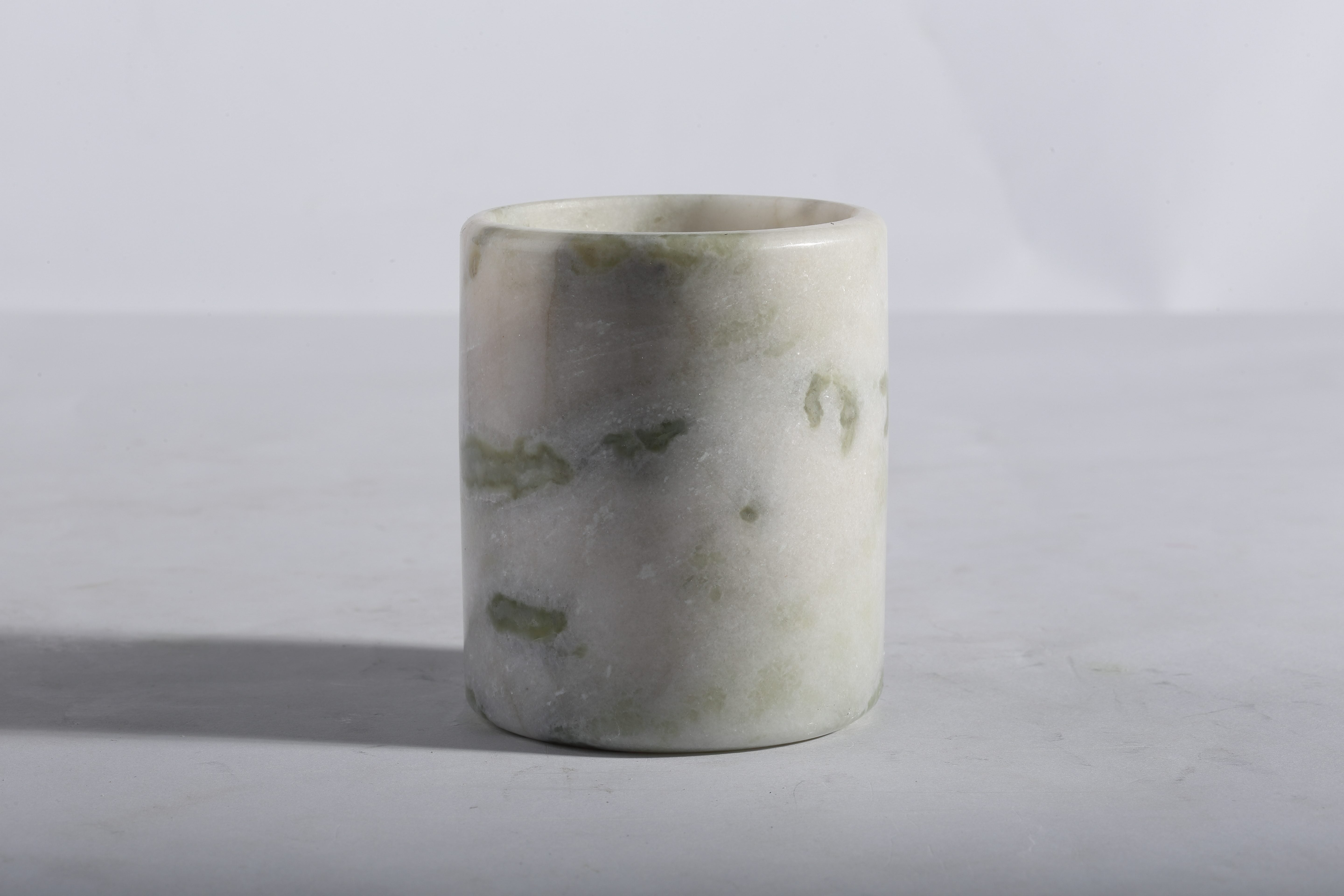 Koville green scented candle in natural stone