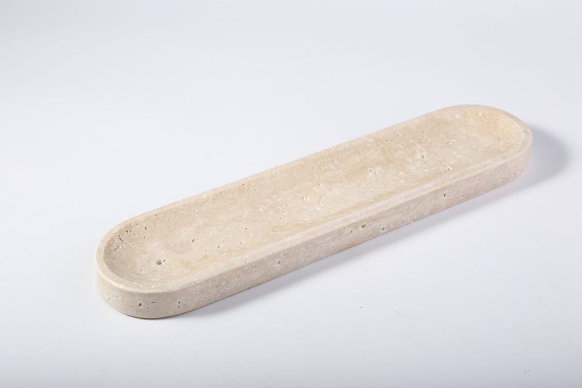 Koville beige Travertino Romano oval incense burner with warm cream tones with natural pores