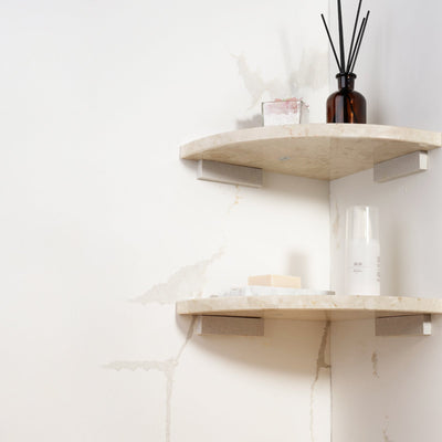 Koville Engineered Marble corner shelf in Perlato appia for a bathroom corner
