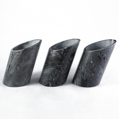 Koville Natural Stone Angled Wine Cooler in Monte Grigio on a bar counter with a wine bottle