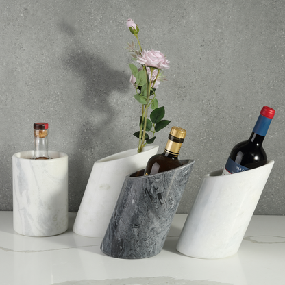 Koville Natural Stone Angled Wine Cooler in Namib Fantasy on a bar counter with a wine bottle