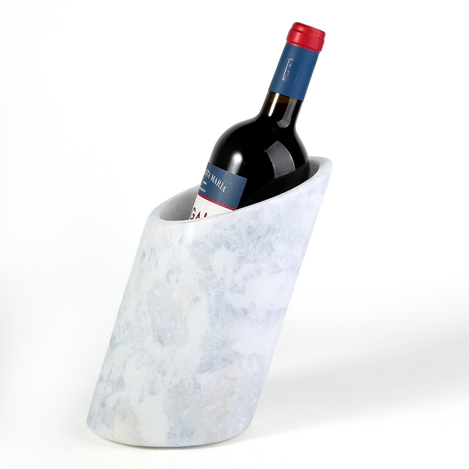 Koville Natural Stone Angled Wine Cooler in Namib Sky on a bar counter with a wine bottle