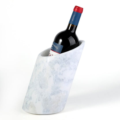 Koville Natural Stone Angled Wine Cooler in Namib Sky on a bar counter with a wine bottle