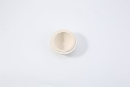 Koville natural marble incense burner d 100 in Moleanos Beige with burning incense stick
