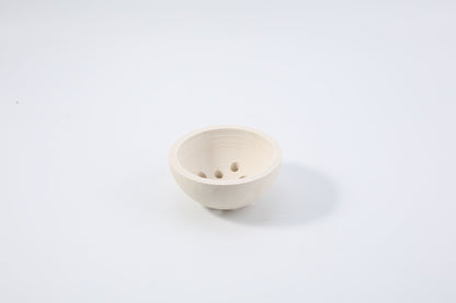 Koville natural marble incense burner d 100 in Moleanos Beige with burning incense stick