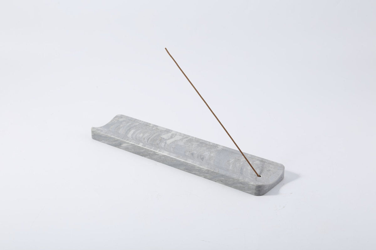 Koville incense holder in Palissandro Blue with burning incense stick