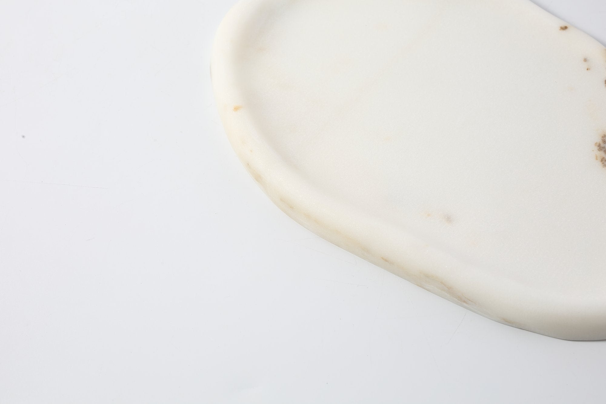 Koville lace edge storage tray for small items in Oriental Calacatta natural stone