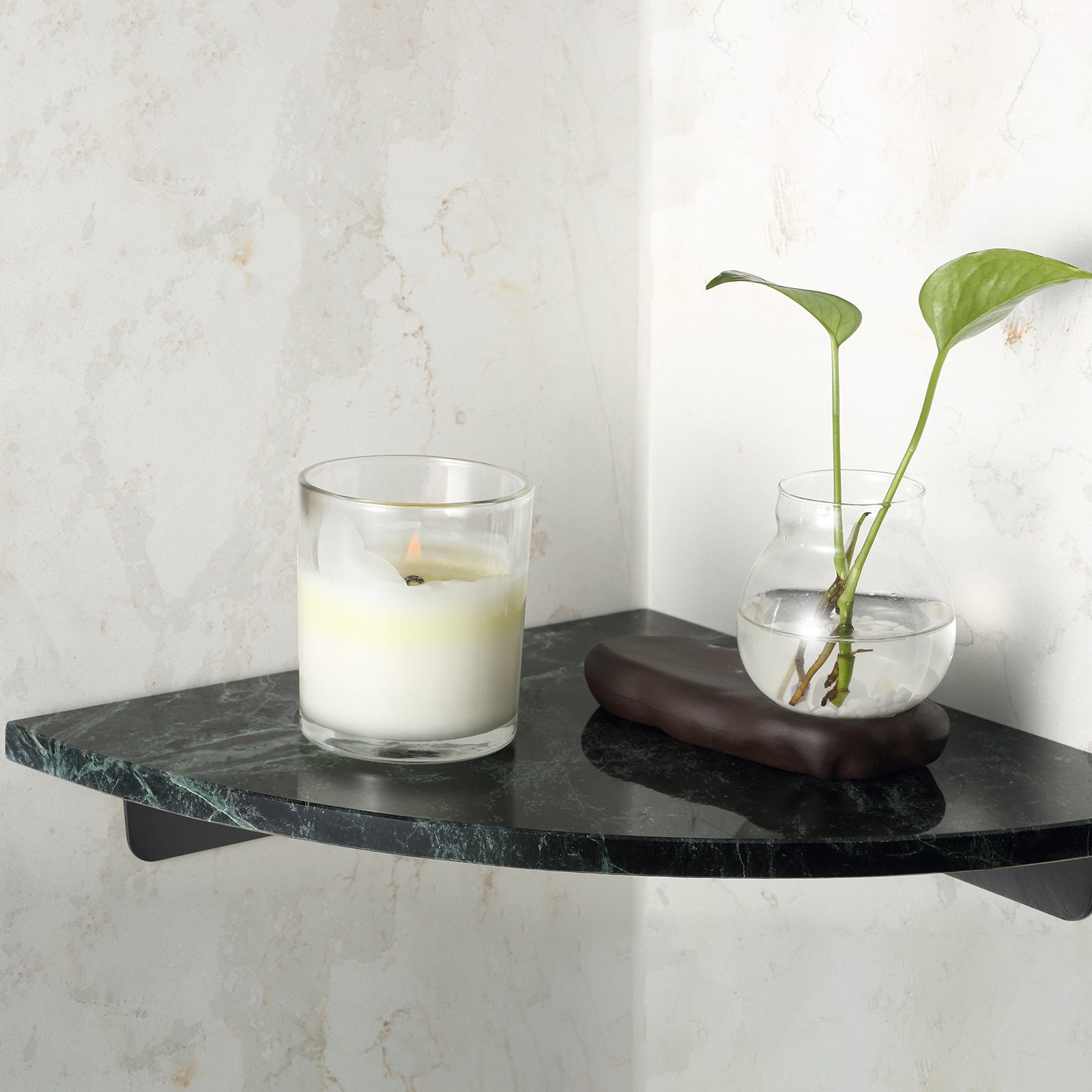 Koville Natural Marble corner shelf in Indian Green for a bathroom corner