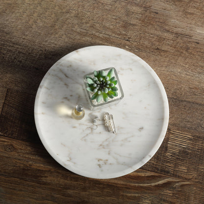 Koville round serving tray in multiple sizes for table styling in Volakas natural stone