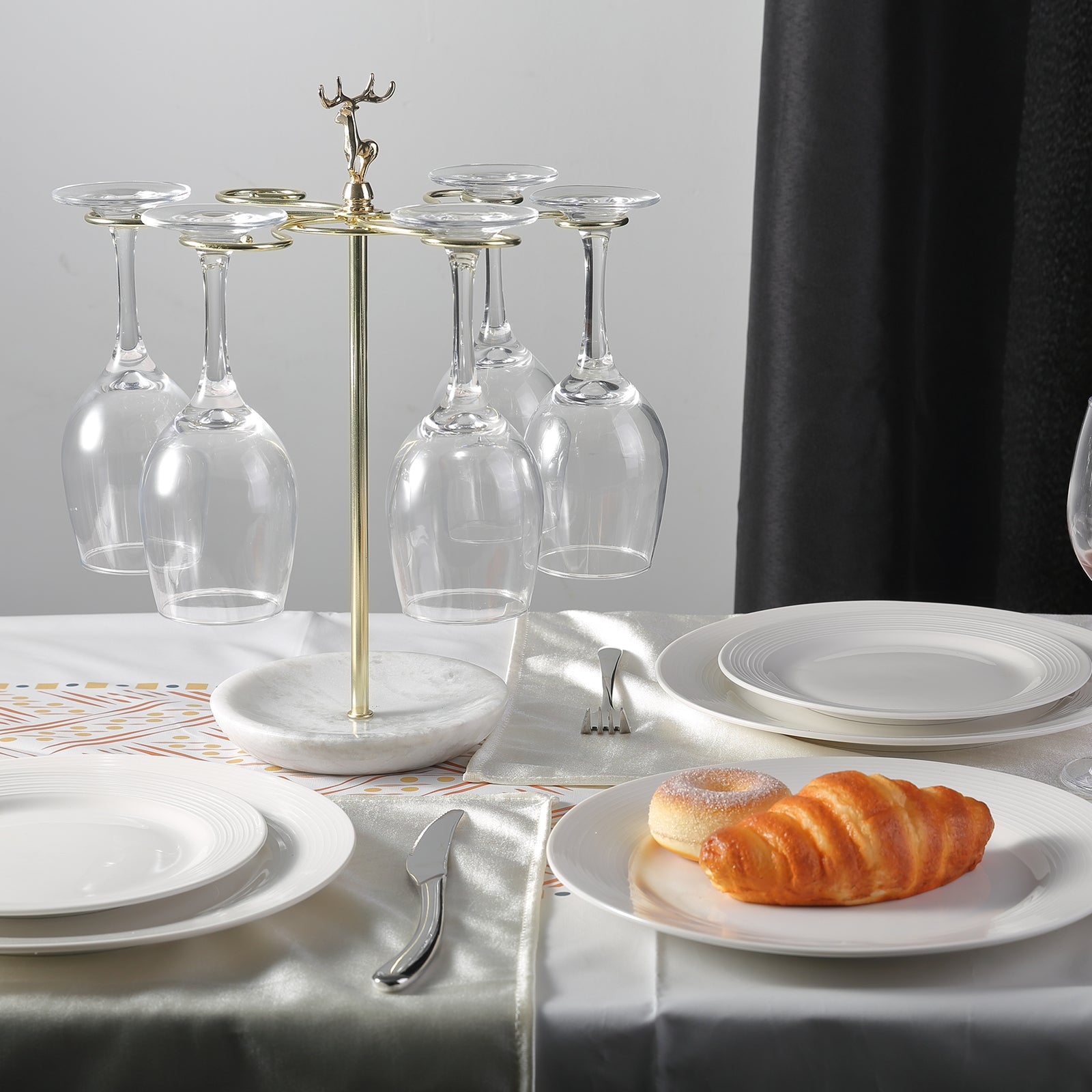 Koville Natural Stone Stemware Rack in Namib Fantasy mounted under a cabinet holding wine glasses