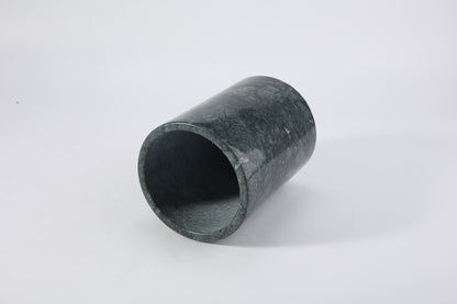 Koville Natural Stone Straight Wine Cooler in Indian Green on a dining table with a wine bottle