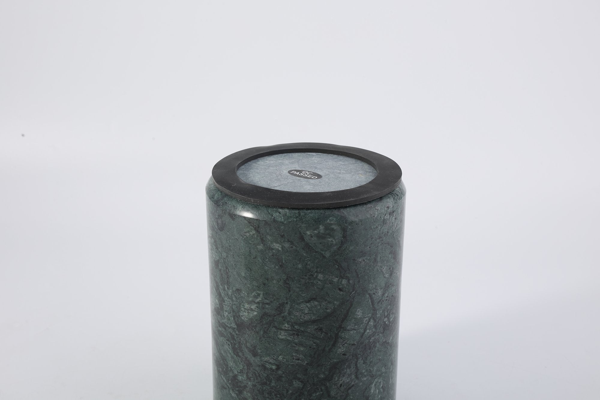 Koville Natural Stone Straight Wine Cooler in Indian Green on a dining table with a wine bottle
