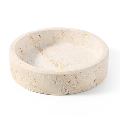 Koville Natural Stone Wine Bottle Holder in Namib Fantasy on a dining table holding a wine bottle