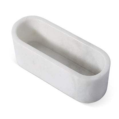 Koville natural marble candlelight cup 200 76 76 in Namib Bianco with a lit tea light candle