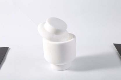 Koville natural marble candlelight cup d 100 t 140 in Namib Bianco with a lit tea light candle