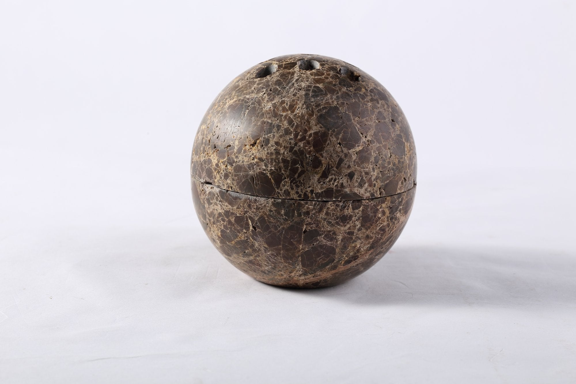 Koville natural marble incense burner d 100 in Light Emperador with burning incense stick