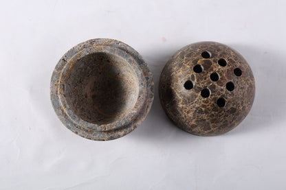 Koville natural marble incense burner d 100 in Light Emperador with burning incense stick