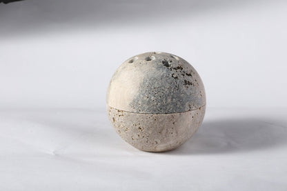 Koville natural marble incense burner d 100 in Travertine Silver with burning incense stick