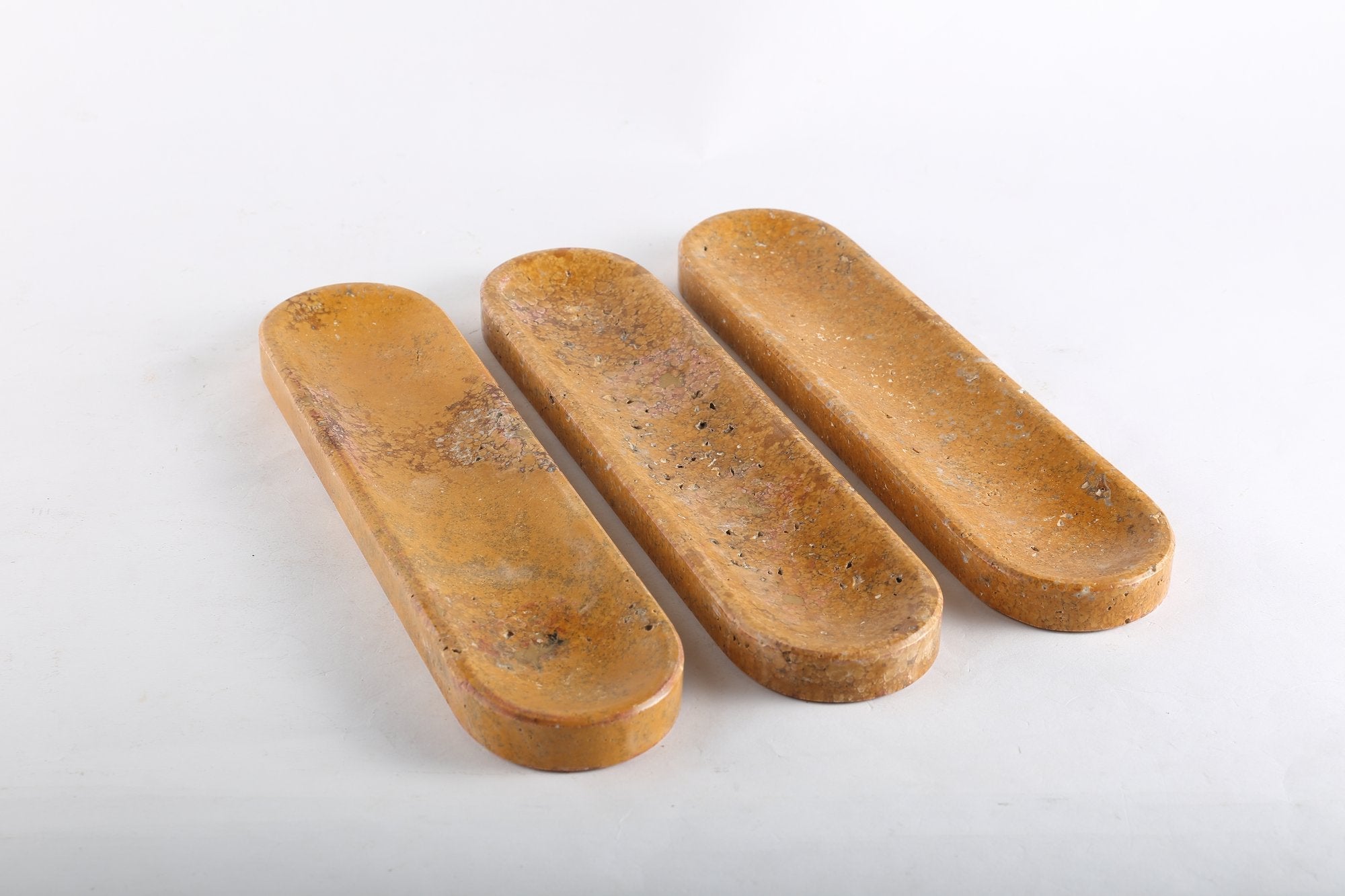 Koville natural marble incense burner pro oval in Golden Travertine with burning incense stick