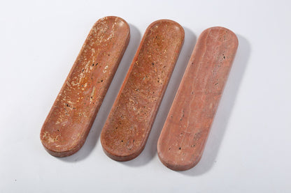 Koville natural marble incense burner pro oval in Red Travertine with burning incense stick