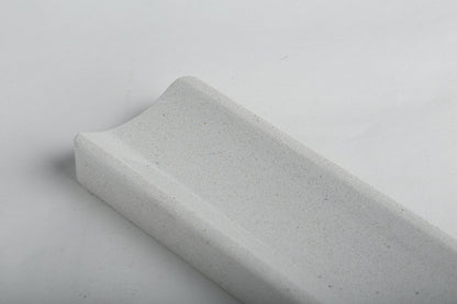 Koville natural marble incense holder in Ariete Quarella with burning incense stick