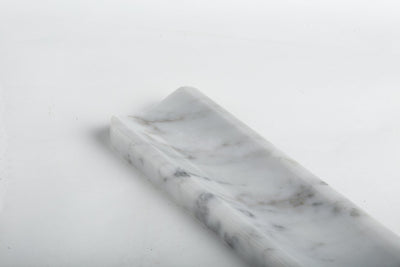 Koville incense holder in Bianco Carrara with burning incense stick