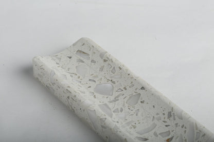 Koville natural marble incense holder in Calacatta Quarella with burning incense stick
