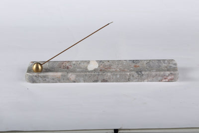 Koville incense holder in Fior di Pesco Quarella with burning incense stick