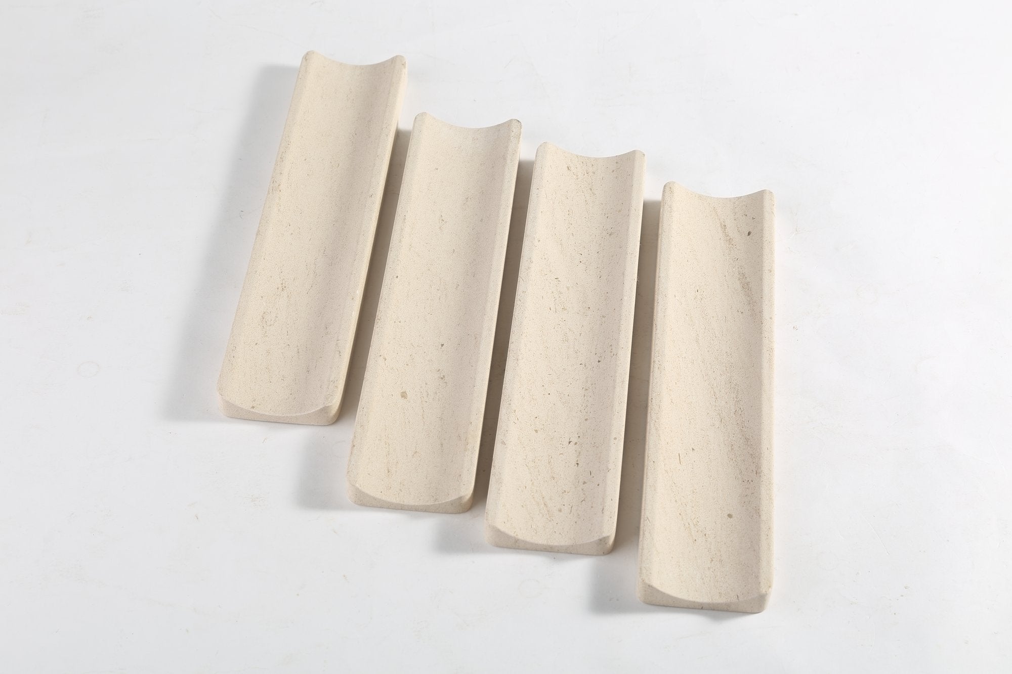 Koville natural marble incense holder in Moca Crema with burning incense stick