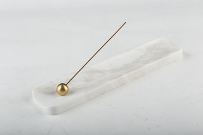 Koville natural marble incense holder in Namib Bianco with burning incense stick