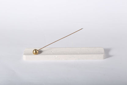 Koville natural marble incense holder in Rhino Grey with burning incense stick
