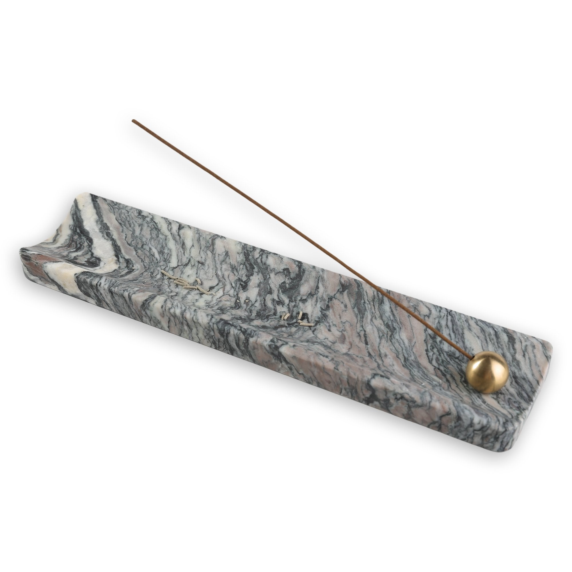 Koville natural marble incense holder in Rosso Luana with burning incense stick