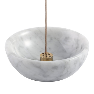 Koville incense holder in Bianco Carrara with burning incense stick