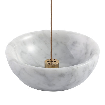 Koville natural marble incense holder pro d 130 t 45 in Bianco Carrara with burning incense stick