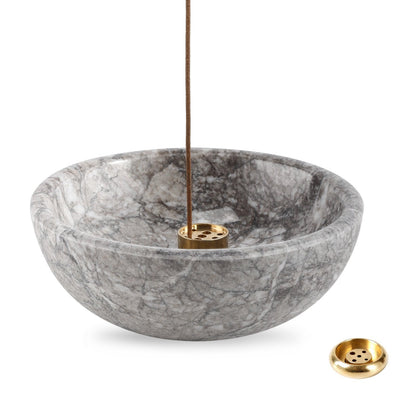 Koville natural marble incense holder pro d 130 t 45 in Gris Lido with burning incense stick