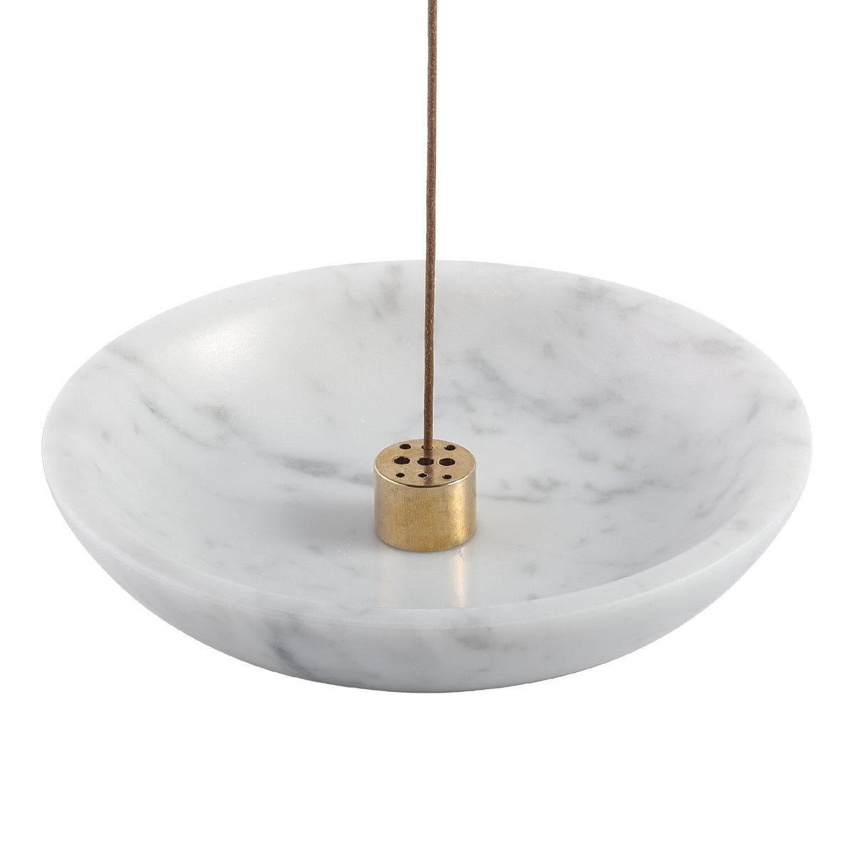 Koville incense holder in Bianco Carrara with burning incense stick